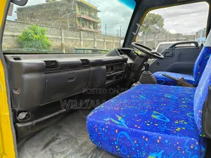 Isuzu NQR 2019 Bus - Yellow