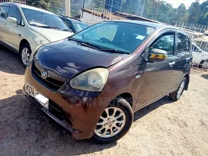Daihatsu Mira 2013 Maroon