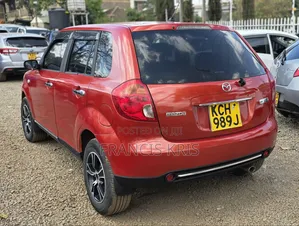 Mazda Verisa 2009 Rangi ya Chungwa