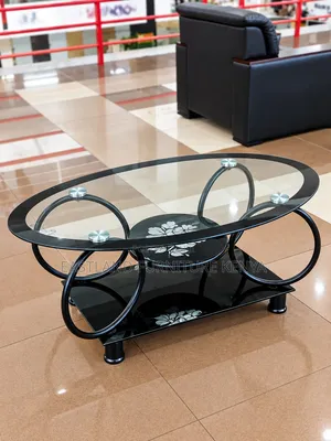 Modern Black Glass Oval Coffee Table with Decorative Metal Frame