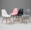 Eames-Style Molded Plastic Dining Chairs with Wooden Legs - 1