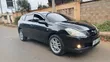 Toyota Caldina 2006 Nyeusi - 1