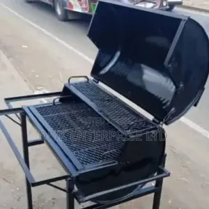 Barrel-Style Charcoal Barbecue Grill