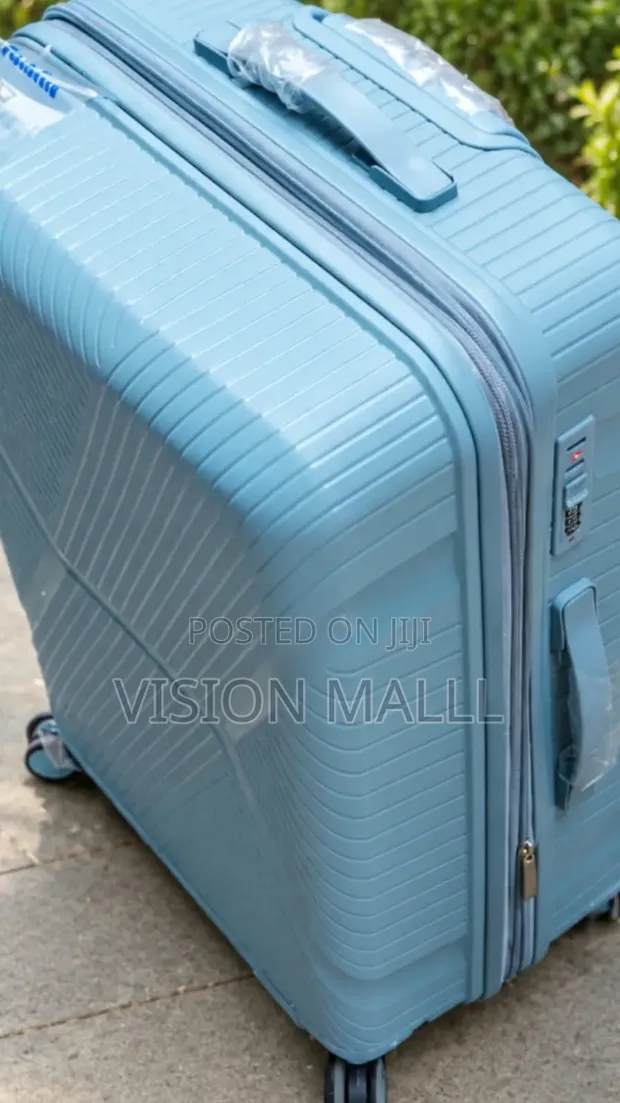 Unbreakable Rubber Suitcase - 360° Wheels - 1