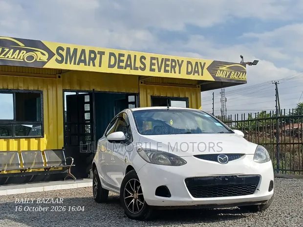 Mazda Demio 2009 Nyeupe - 1