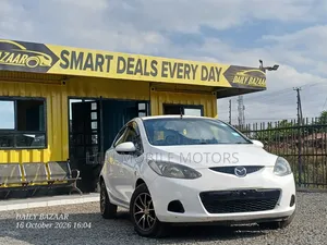 Mazda Demio 2009 Nyeupe