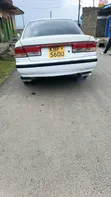 Nissan Sunny 2013 Nyeupe - 4