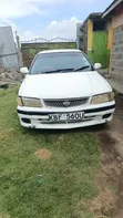 Nissan Sunny 2013 Nyeupe - 5