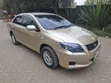 Toyota Axio 2009 Dhahabu - 1