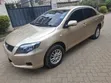 Toyota Axio 2009 Dhahabu - 3