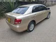 Toyota Axio 2009 Dhahabu - 4