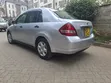 Nissan Tiida 2009 Nyeusi - 4