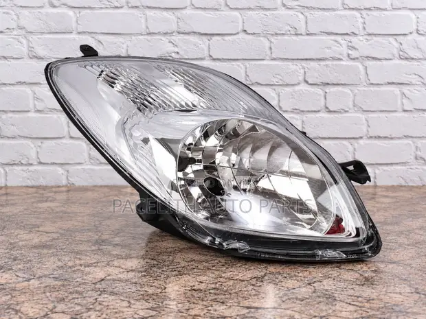 Casp Headlight for Toyota Vitz 2009-2010 - 1