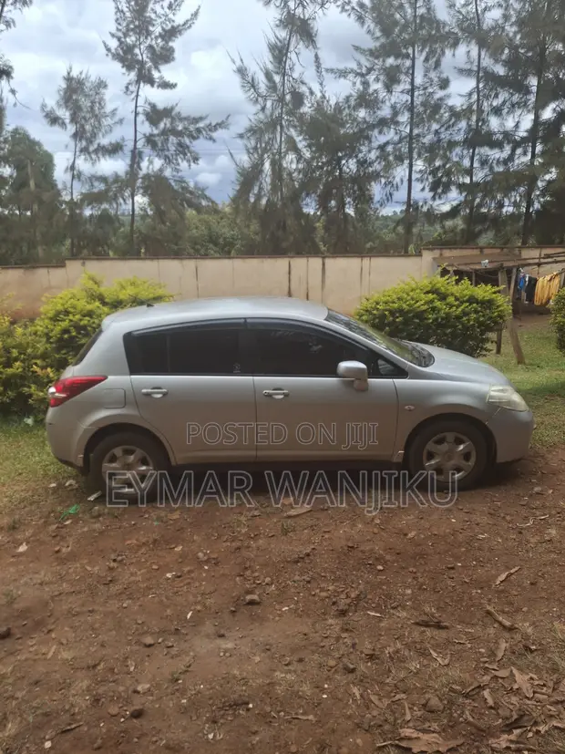 Nissan Tiida 2012 Silver - 1