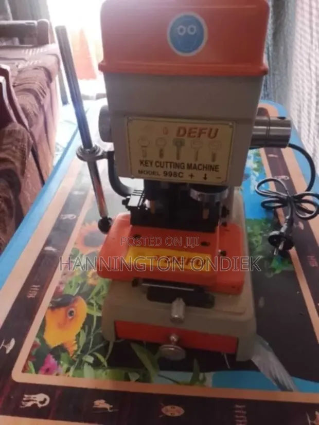 Dufe Company Key Cutting Machine - 1