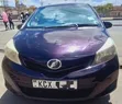 Toyota Vitz 2012 Burgundy - 1