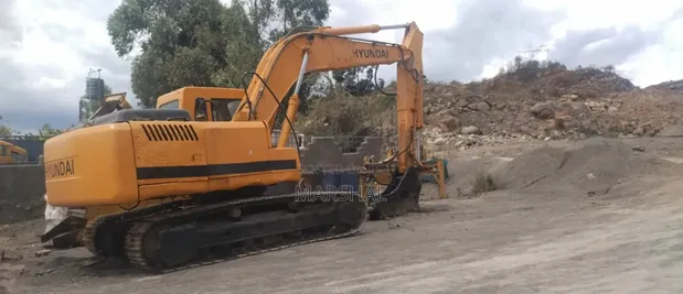 Hyundai 215 Excavator - 1