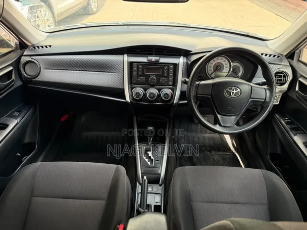 Toyota Corolla Fielder 2015 Nyeupe - 1