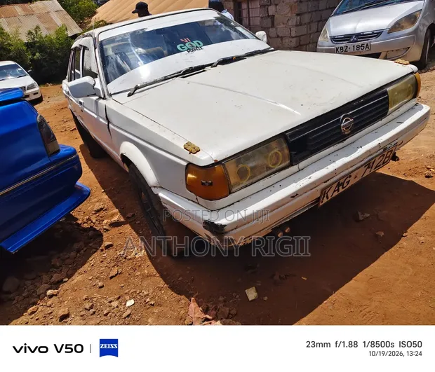 Nissan Sunny B12 Sedan 1.3 1990 White - 1