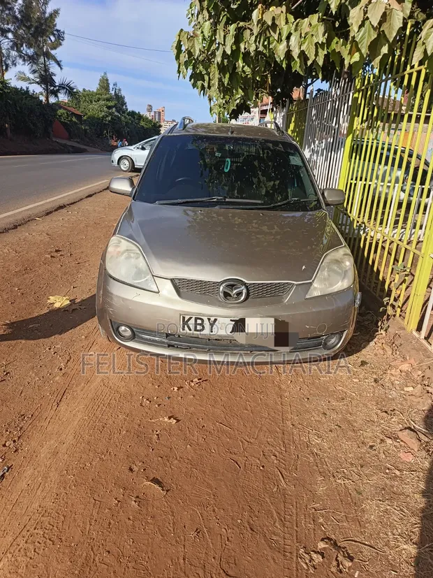 Mazda Demio 2007 Kahawia - 1