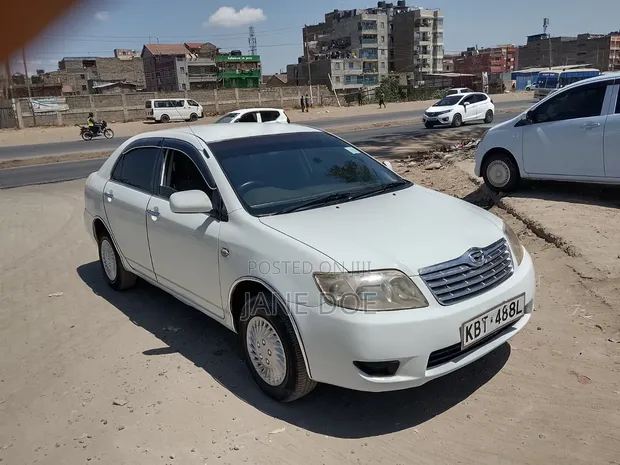 Toyota Corolla 2005 Nyeupe - 1
