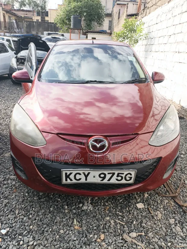 Mazda Demio 2013 Maroon - 1