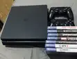 Used PS4 Slim 500GB/1TB with 2 Controllers & 7 Games - 2