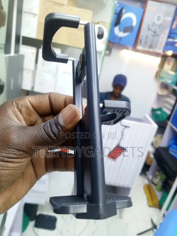 Adjustable Phone & Tablet Clamp for Tripods/Selfie Sticks - 1