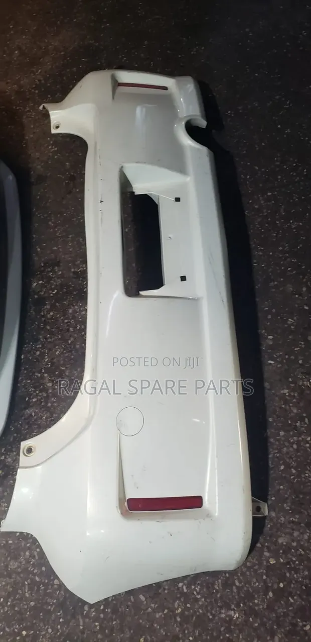Toyota Passo 2005 Rear Bumper with Reflectors - 1