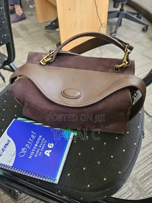 Long Brown Shoulder Bag with Gold Accents