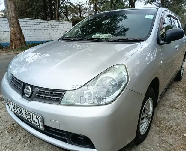 Nissan Wingroad 2009 Silver - 1