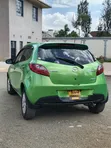 Mazda Demio 2011 Kijani - 4