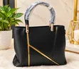 Elegant Black Ladies Handbag with Gold Details - 1