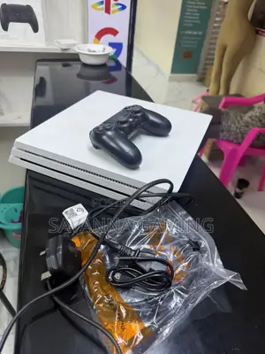 PS4 Pro with 16 Games and 2 Controllers