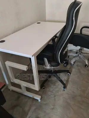 Black and White Office Desk with Ergonomic Chair