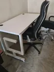 Black and White Office Desk with Ergonomic Chair - 1