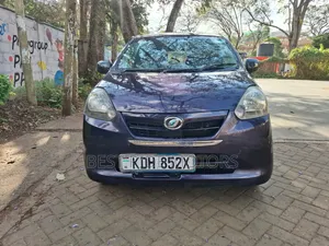 Daihatsu Mira 2015 Zambarau