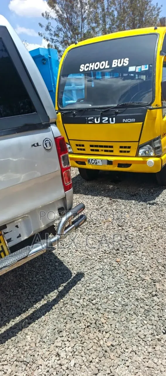 Isuzu NQR 2015 Basi la Shule la Viti 33 - 1