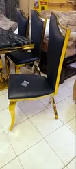 Set ya Meza ya Kula Nyeusi ya Marumaru ya Kifahari ya Watu 6 na Viti vya Miguu ya Dhahabu ya X - 2