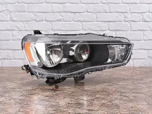 Depo Headlight ya Mitsubishi Outlander (2010-2011)