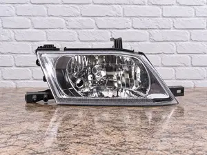 Nissan Wingroad Y11 Headlight - Clear Plastic Lens