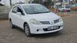 Nissan Tiida 1.5L 16V 2010 White - 1