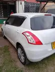 Suzuki Swift 2015 Nyeupe - 1