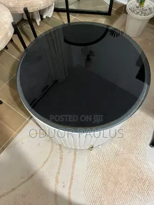 Stylish Round Coffee Table - Black Glass & White Fluted Base