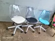 Modern Swivel Chair with Transparent Back and Wheels - 1