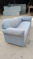Luxury Asymmetric Channel-Tufted Sofa with Gold Metallic Inlay Trims - 1