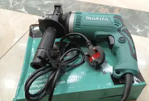 Makita 1630 Impact Drill - Brand New