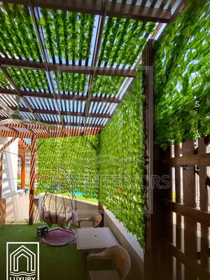 Artificial Green Privacy Fence with Leaves