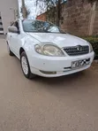Toyota Corolla 2004 Nyeupe - 1