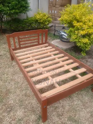 Used 3.5 by 6ft Wooden Bed Frame